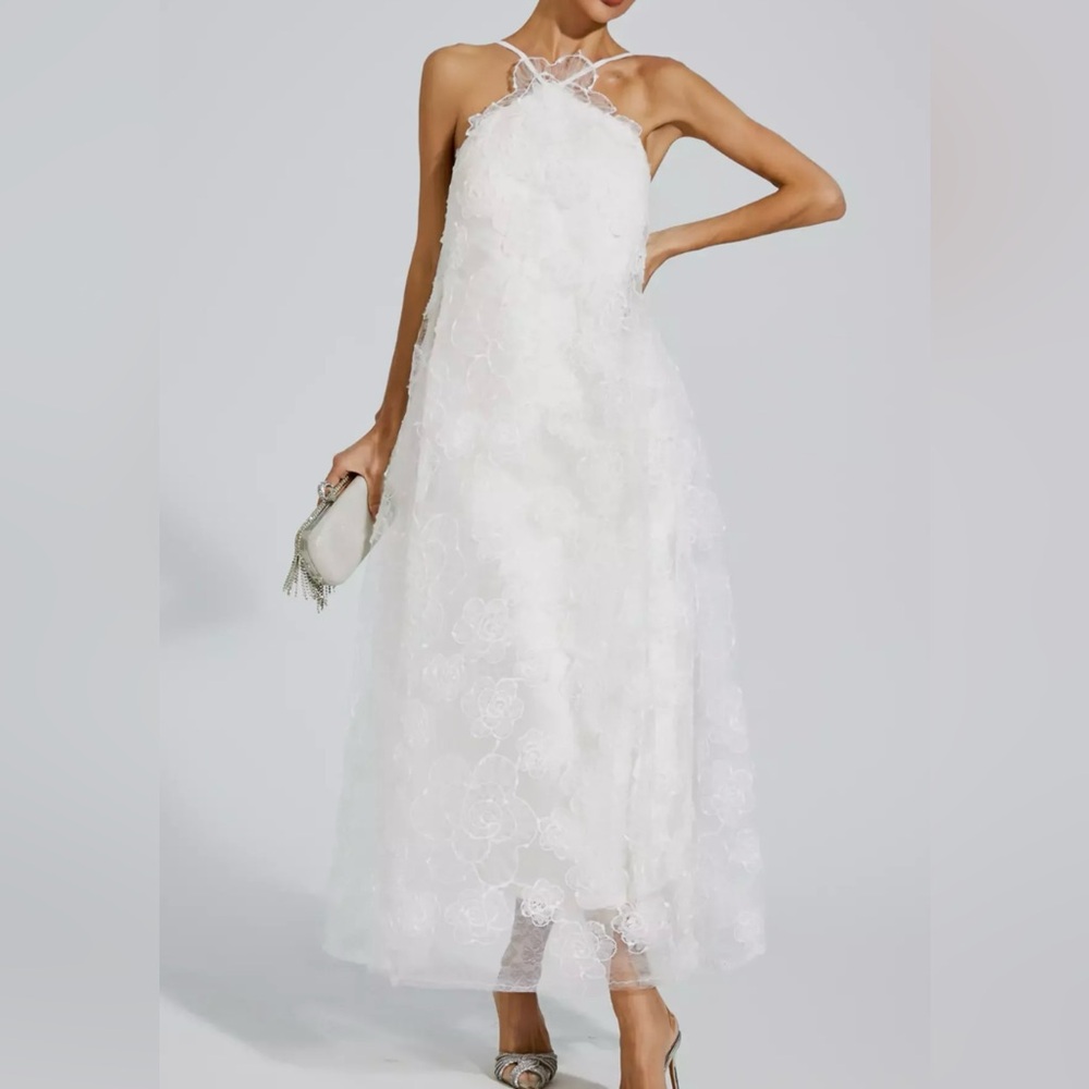 Beautiful ivory/cream floral dress! Worn once to my rehearsal dinner.